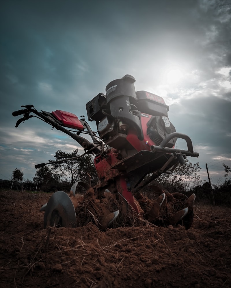 A rotavator breaking up soil